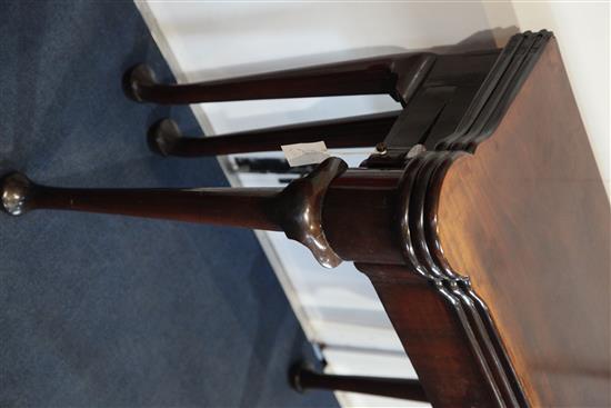 A George II mahogany combined tea, card and games table, H.2ft 6in. W.2ft 7in. D.1ft 4in.